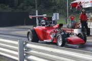 Red Altered Drag Car Launching